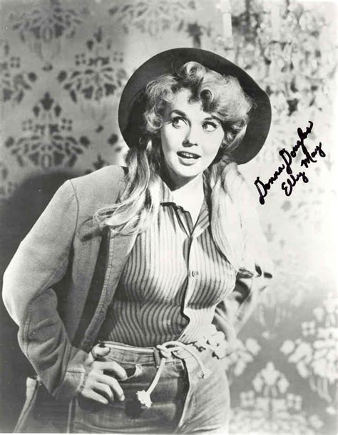 Elly May (Portrayed by Donna Douglas in all 274 episodes) the only child of Jed and Rose Ellen Clampett, is a mountain beauty with the body of a pinup girl and the soul of a tomboy. She can throw a fastball as well as "rassle" most men to a fall, and she can be as tender with her friends, animals, and family as she is tough with anyone she rassles. She says once that animals can be better ...